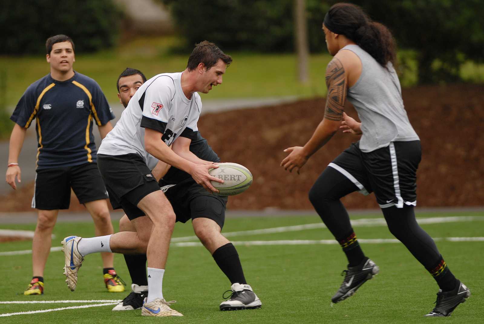 Sosefo Mailangi attempts to score durning practice for the SF State rugby club Friday, Sept. 13, 2013. Photo by Samantha Benedict / Xpress