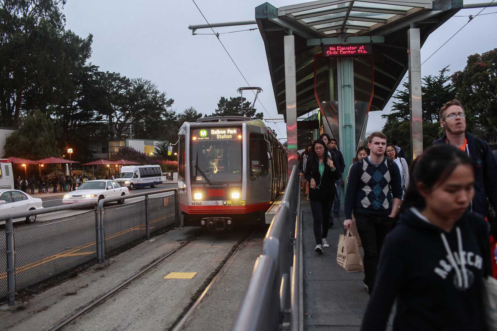 SF State students load on and off of the outbound M-line train at the 19th and Holloway stop, going toward Balboa Park, Sept. 23, 2013. There is a recent proposal to move the stop to Park Merced to cut down on car collisions with students crossing 19th avenue. Photo by Mike Hendrickson / Xpress