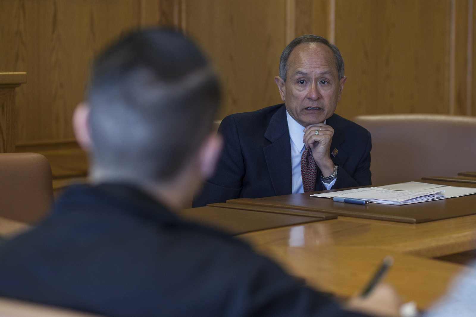 SF State president Leslie Wong answers a question from Matt Saincome about what the university is doing to prevent another Robert Shearer incident, during a press conference with Xpress editors Monday, Oct. 7, 2013 in a conference room in the administration building at SF State. Photo by Mike Hendrickson / Xpress