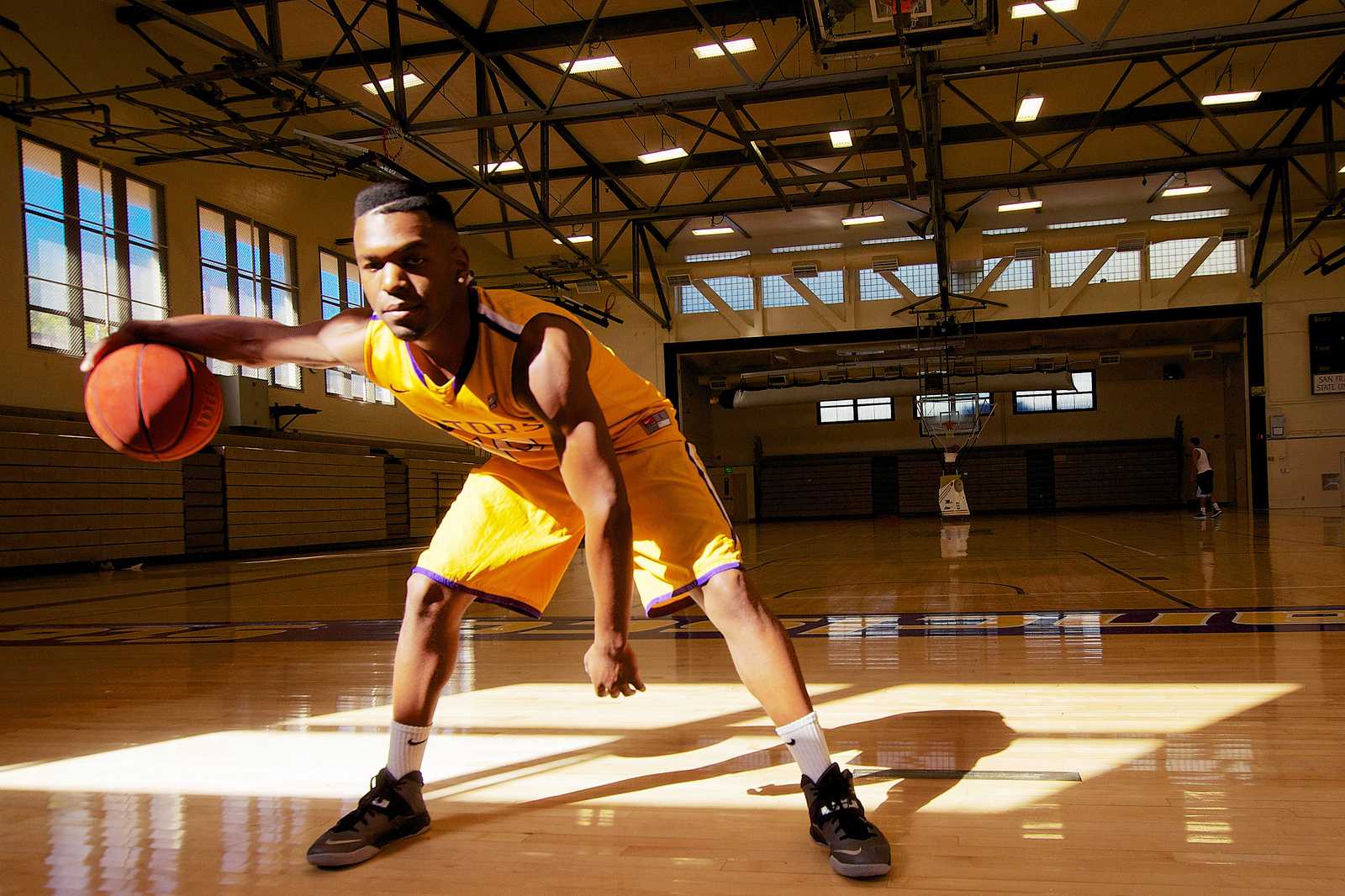 Calvin Otiono, a SF State basketball player, poses for a portrait at SF State Friday Sept. 27, 2013. Photo by Kate O'Neal / Xpress
