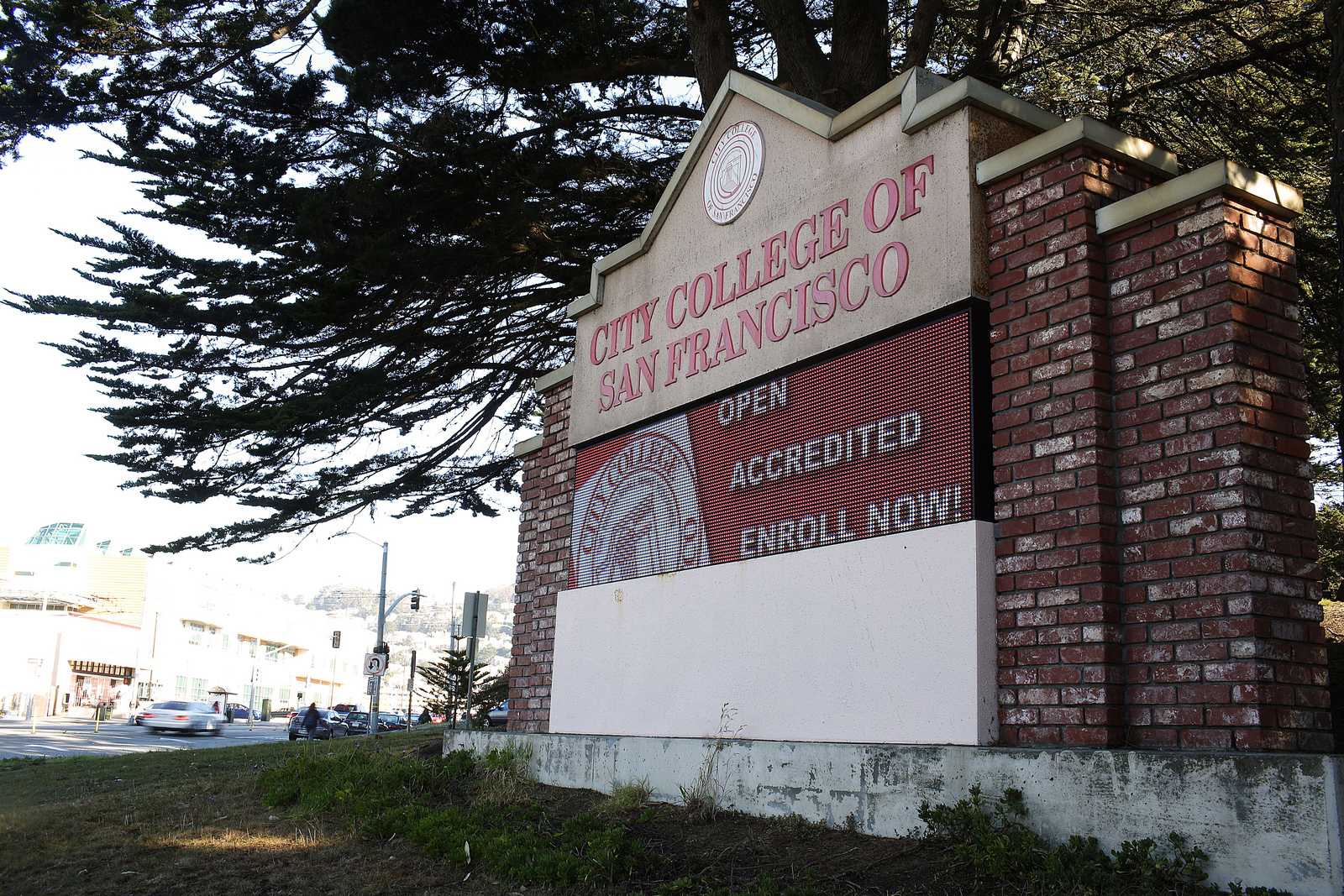 The City College of San Francisco's front sign reads