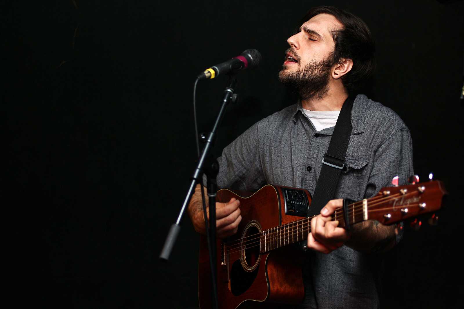 Derek Schultz of Owl Paws performs solo at The Depot's Strung Out acoustic show Wednesday, Oct. 23, 2013. Photo by Tony Santos / Xpress