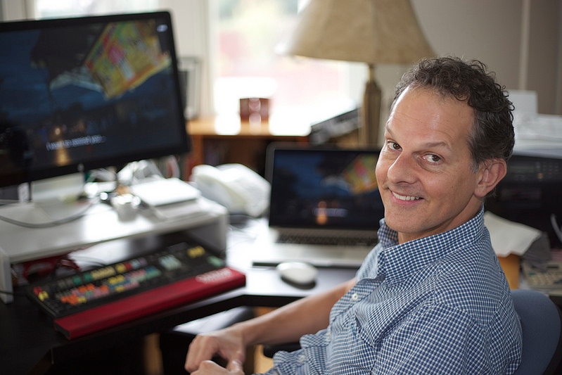 Johnny Symons, assistant professor in the cinema department, sits in front of the computer he uses to edit his film "Out Run" Tuesday, Feb. 4. Symons' film is about LGBTQ candidates' experiences running for office in the Philippines.