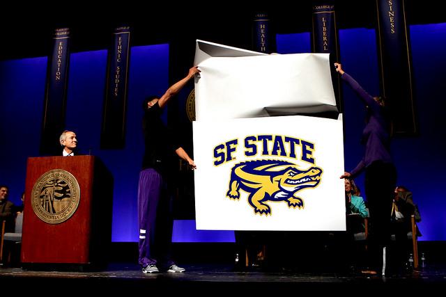 Udun Osakue and Jazmine Williams present the "new" SF State Gator mascot image at the Opening Faculty Meeting (2014-2015) at the McKenna Theatre Monday, August 25 at SF State.  